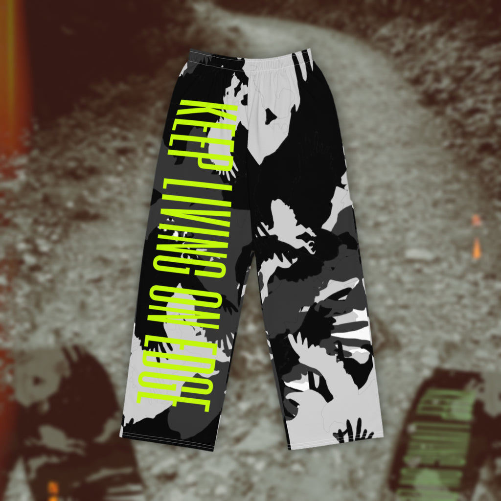 Green All-over print “KEEP LIVING ON EDGE” unisex wide-leg pants